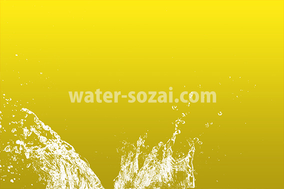 黄色背景の水飛沫が上がる写真・フォト