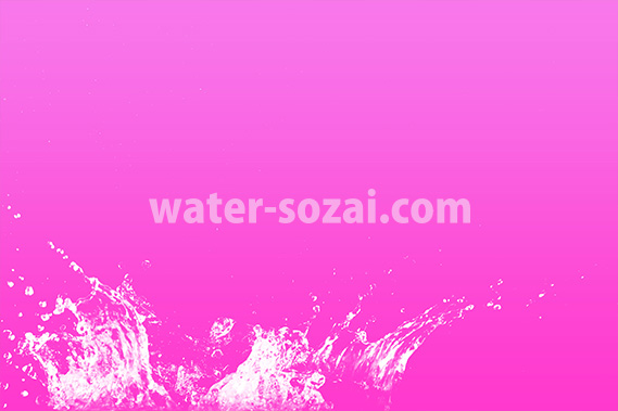 ピンク色背景の水飛沫が上がる写真・フォト