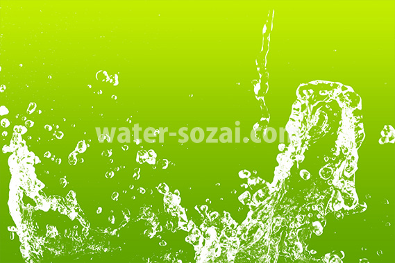 緑背景の水が弾ける写真・フォト