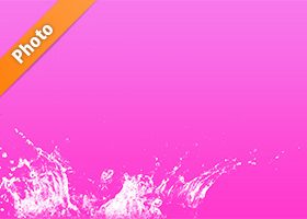 ピンク色背景の水飛沫が上がる写真・フォト